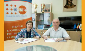 UNFPA Rep and University Rector signing the Memorandum