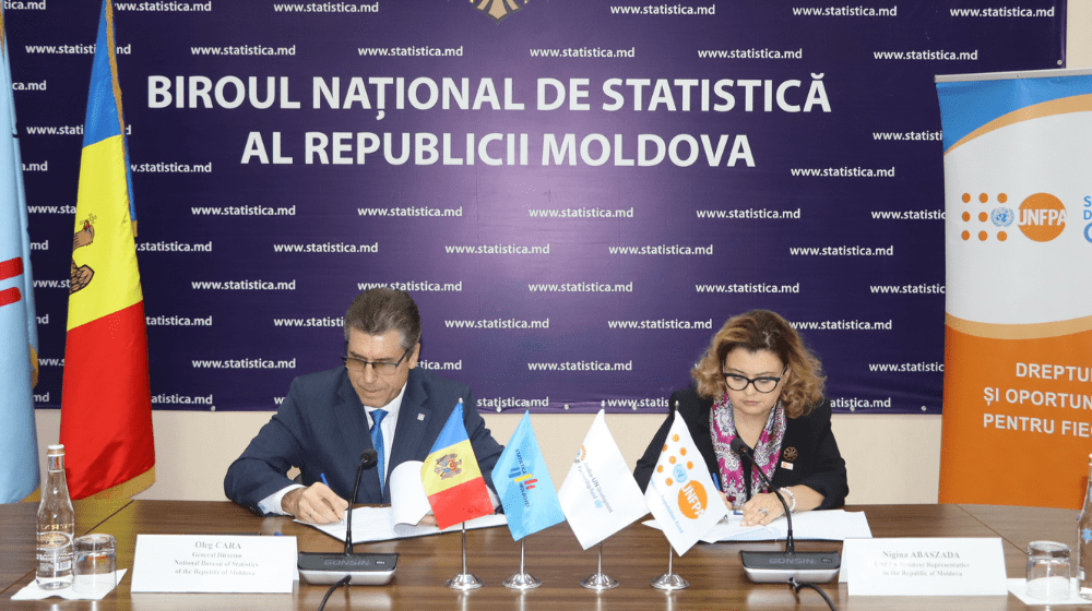 Nigina Abaszada and Oleg Cara signing the MoU