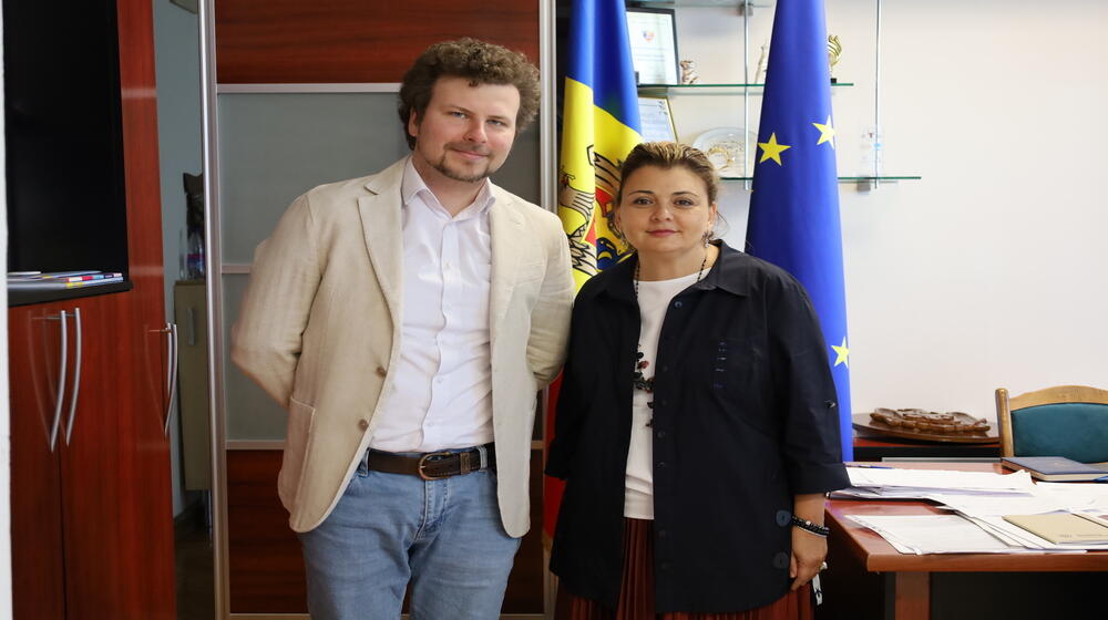 UNFPA representative, Nigina Abaszada and Dan Perciun, Minister of Education and Research pose for the camera