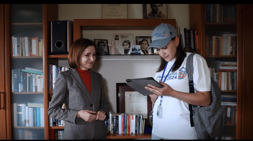 President Maia Sandu being interviewed and "counted" in her house by the census enumerator, Mrs Raisa Puscasu. 